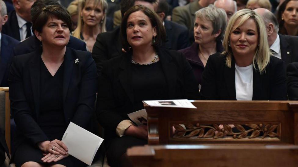 Dame Arlene Foster pictured beside Sinn Féin leader Mary Lou McDonald and First Minister of Northern Ireland Michelle O'Neill