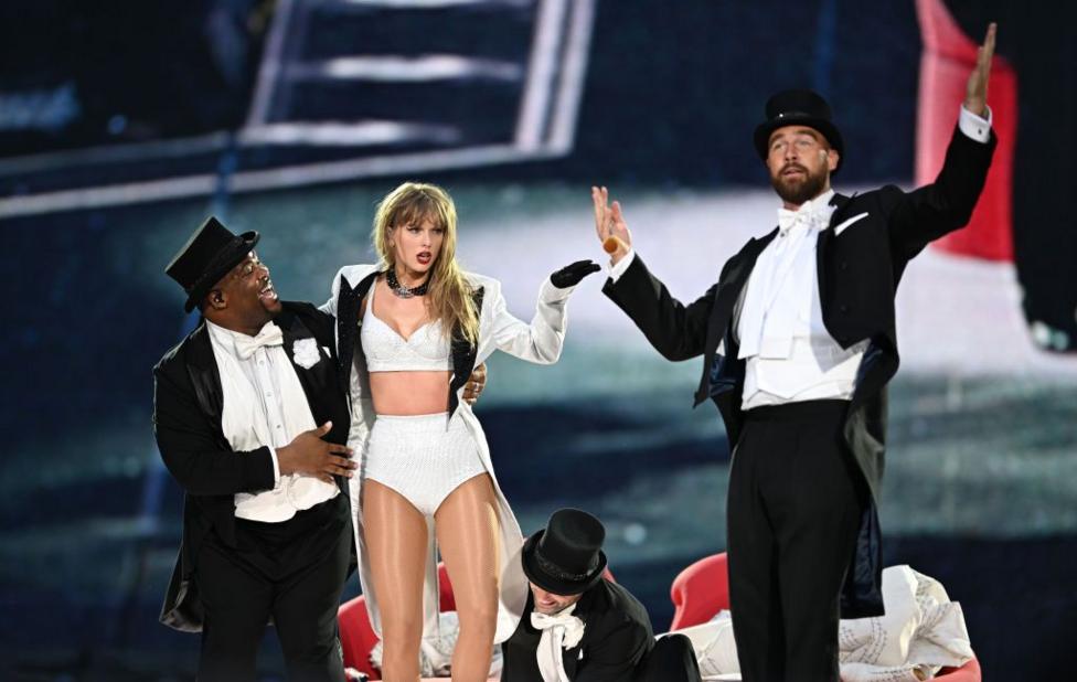 Taylor Swift is joined on stage by Travis Kelce, during The Eras Tour at Wembley Stadium on June 23, 2024 in London