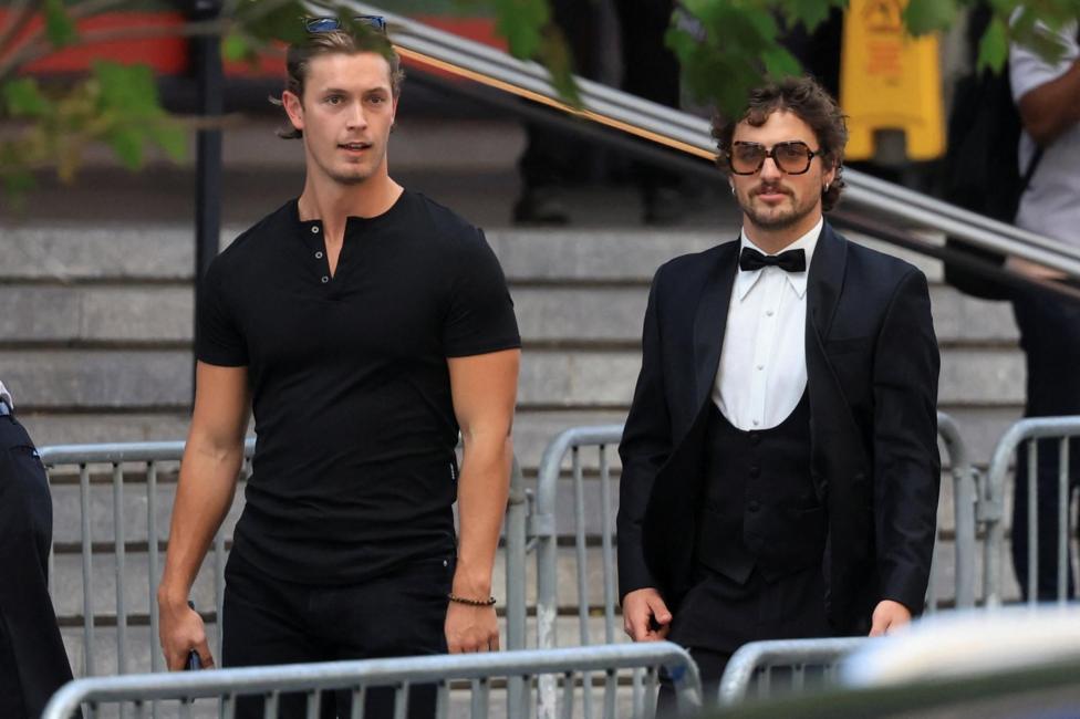 US singer Benson Boone, right, arrives at Madison Square Garden