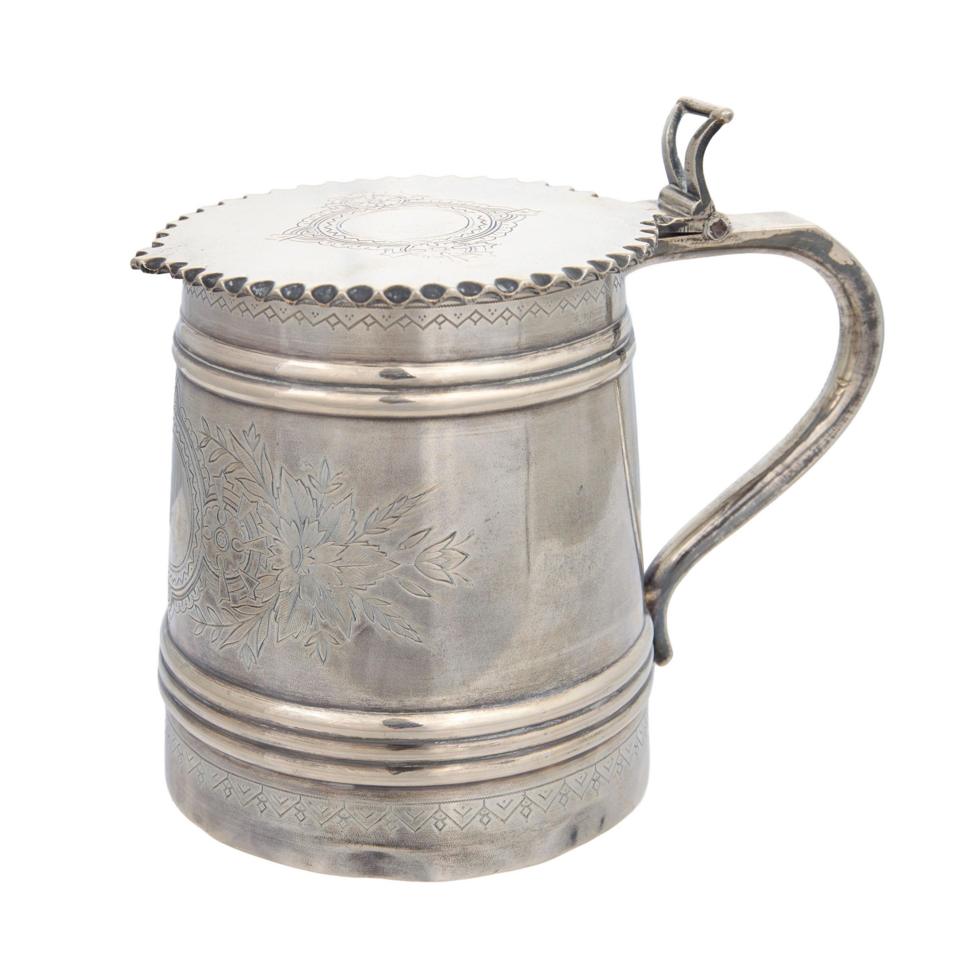 A silver tankard.