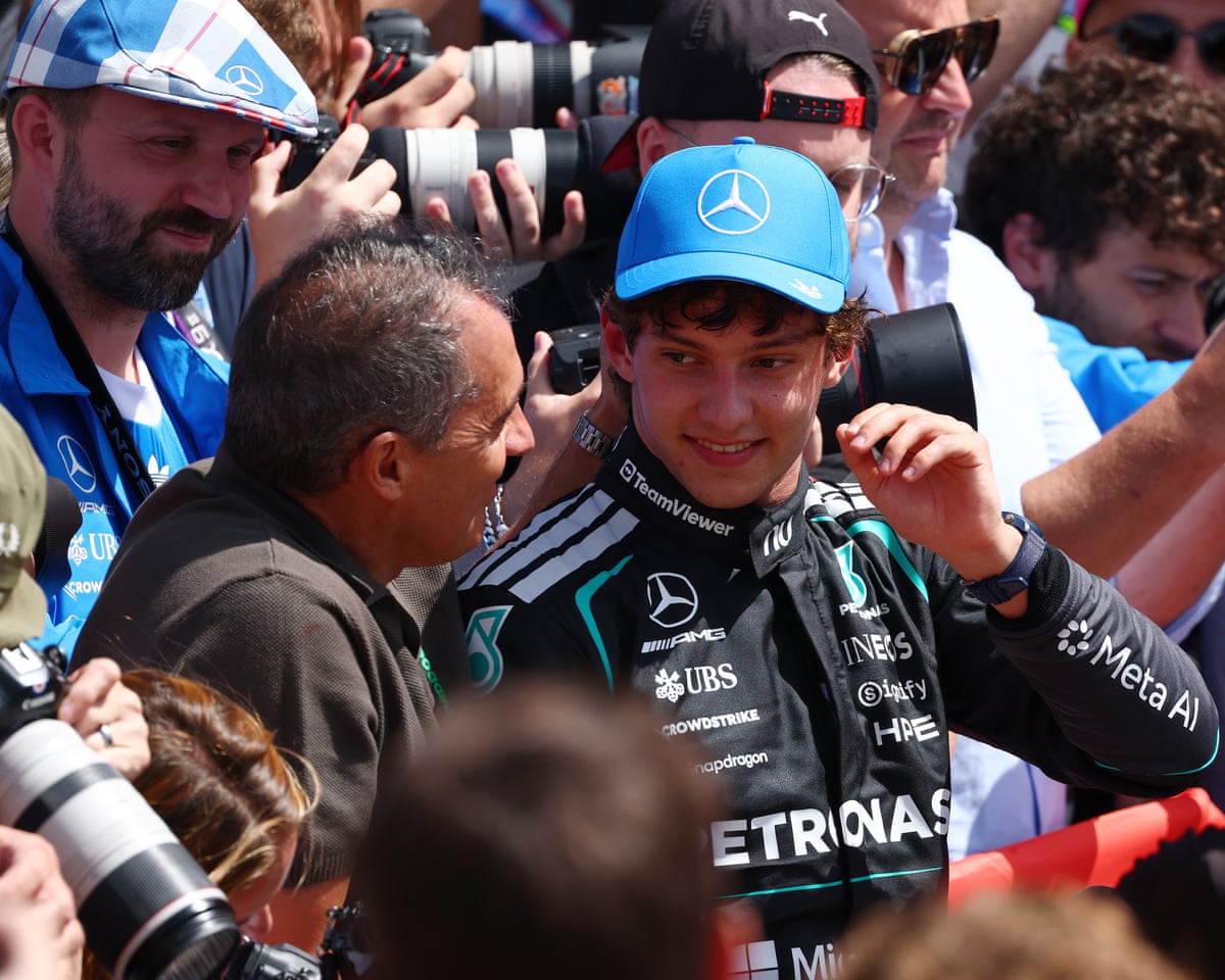 Sprint race winner Kimi Antonelli celebrates with his father Marco and his Mercedes team