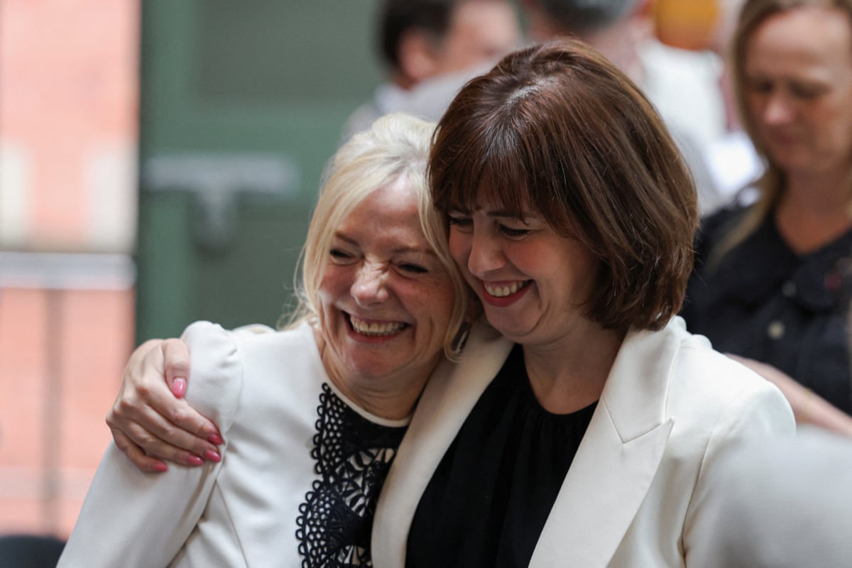 Lucy Powell hugs Tracy Brabin, the mayor of West Yorkshire
