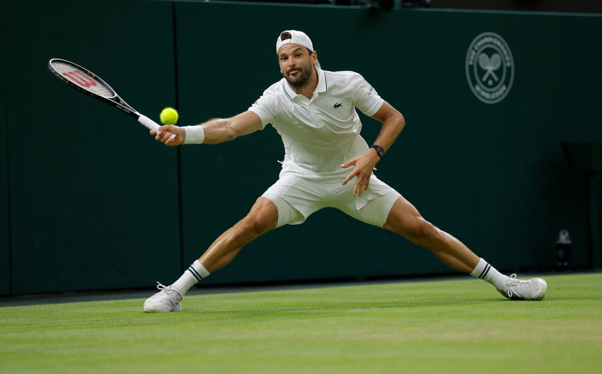 Grigor Dimitrov reaches for a shot against Matteo Berrettini
