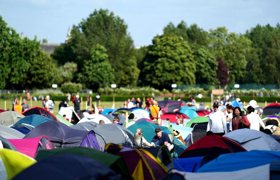 A sea of colourful tents fill up the campsite at the Wimbledon queue