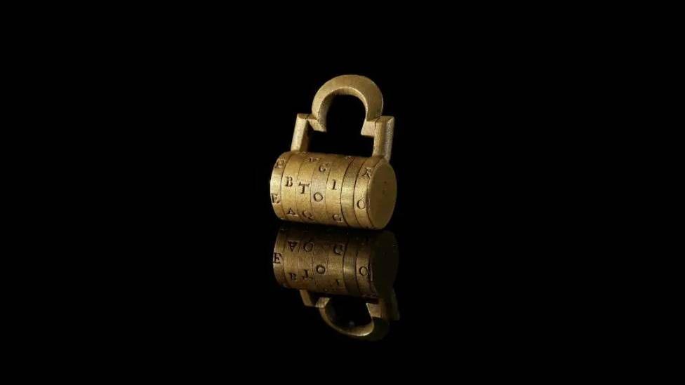 A gold combination lock