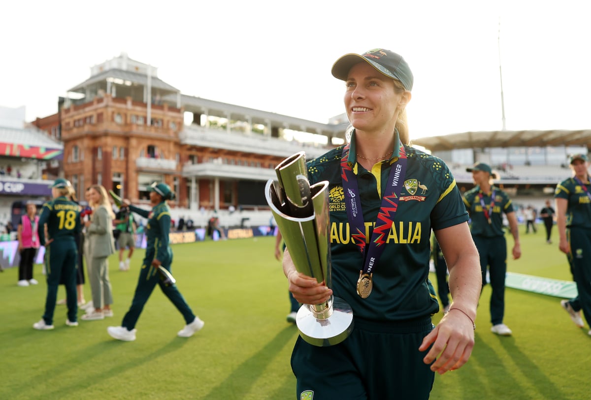Sophie Molineux walks at Lord's holding the T20 World Cup