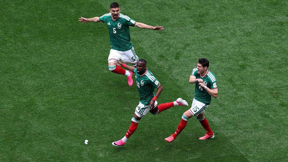 Mexico players celebrate scoring the first goal of the 2026 FIFA World Cup at the Estadio Azteca in Mexico City