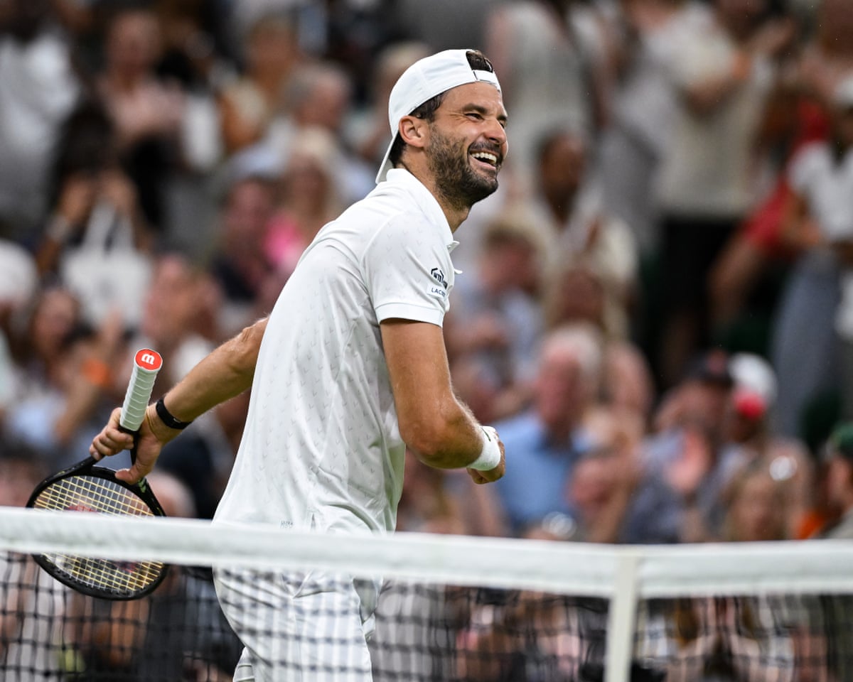 A delighted Grigor Dimitrov beams after beating Matteo Berrettini of Italy