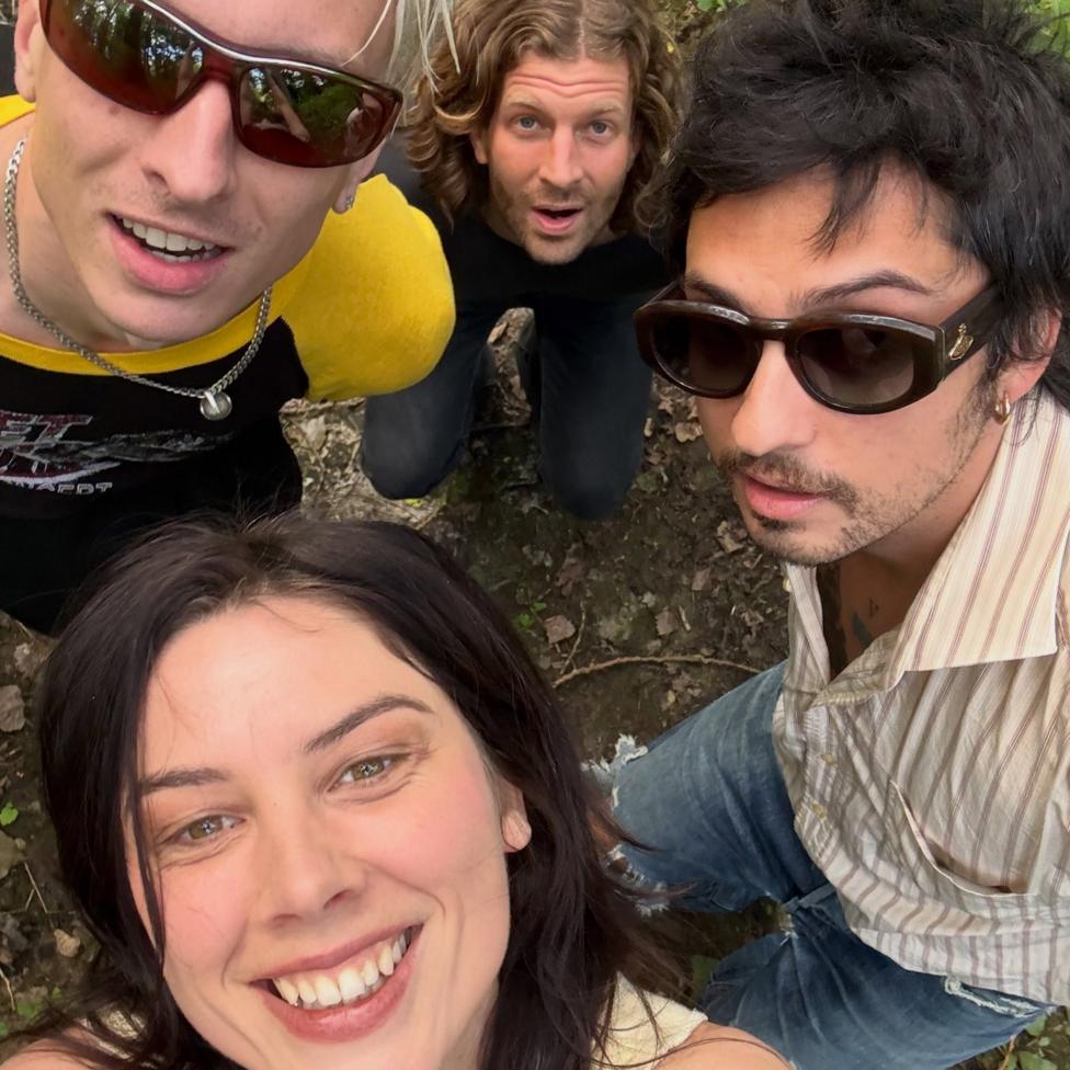 Wolf Alice pose backstage at Finsbury Park