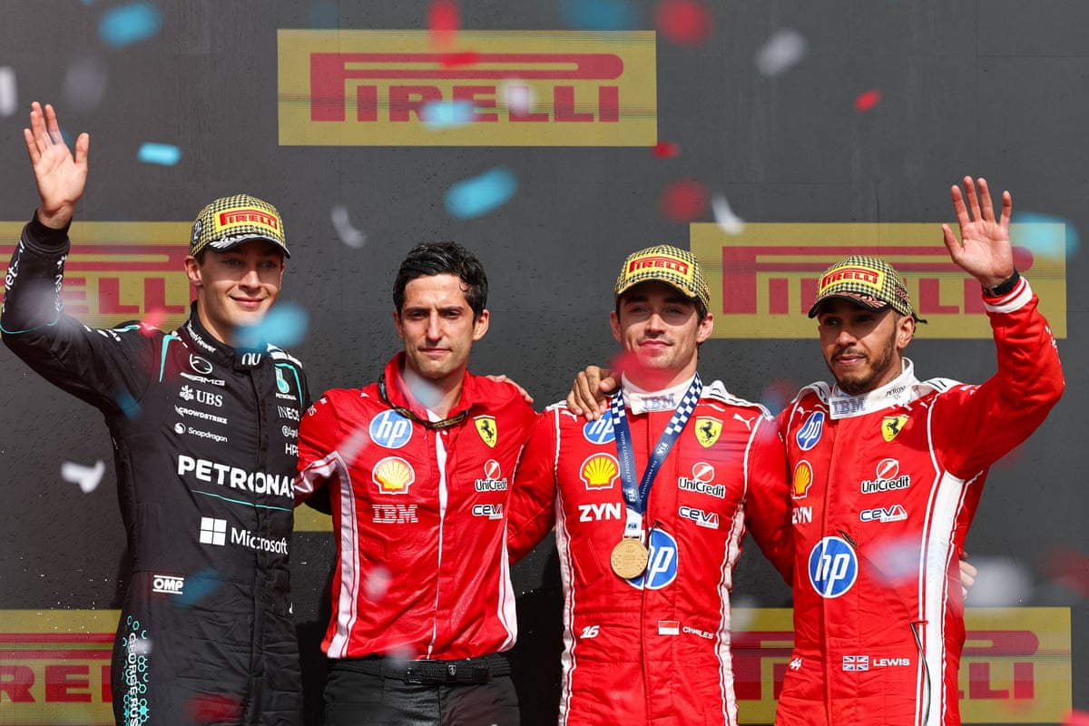 Ferrari’s Charles Leclerc of Monaco, Mercedes’ British driver George Russell, Ferrari’s British driver Lewis Hamilton and Ferrari’s race engineer Bryan Bozzi pose for photos on the podium