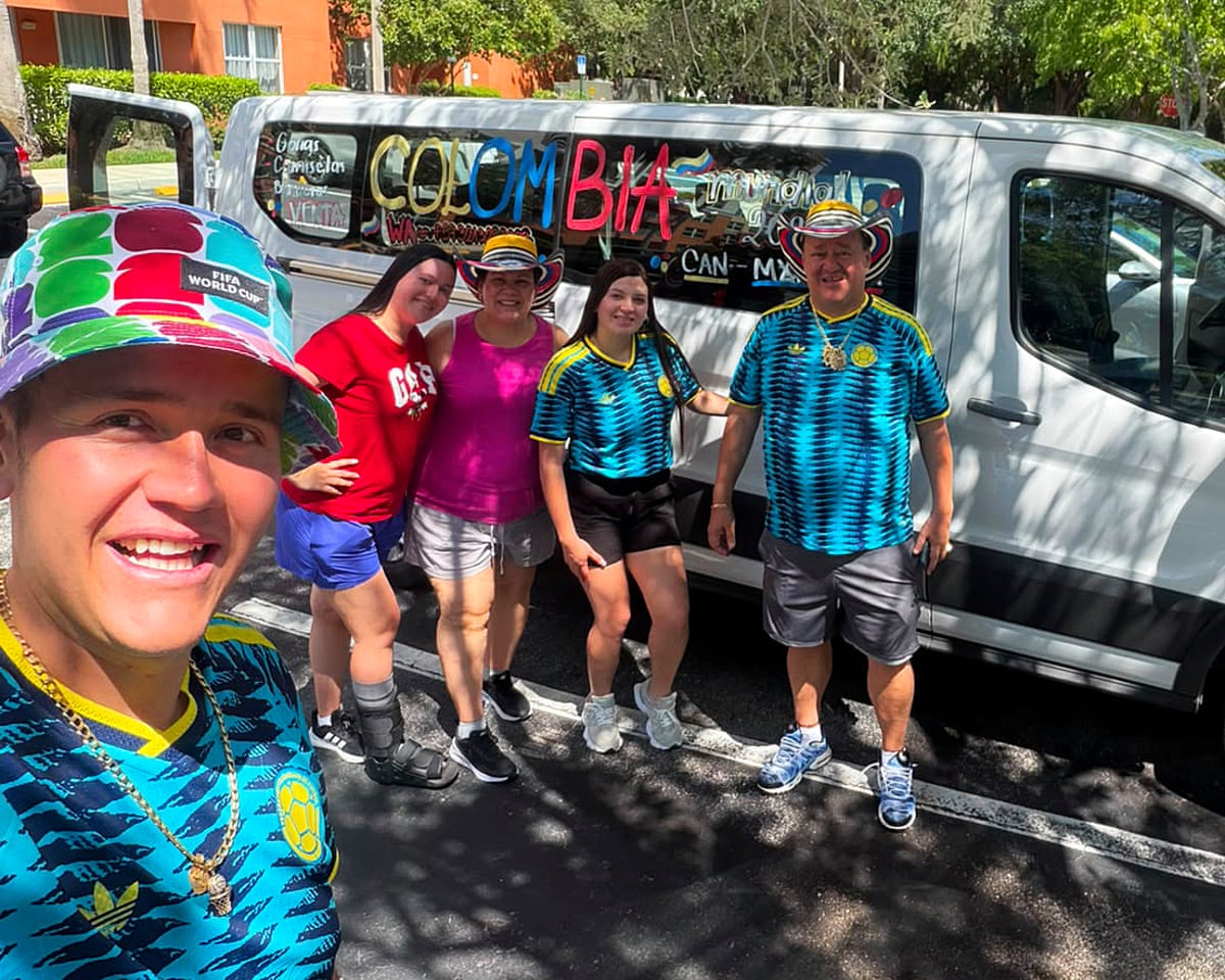 Juan Carlos Mila and his family with their mini van.