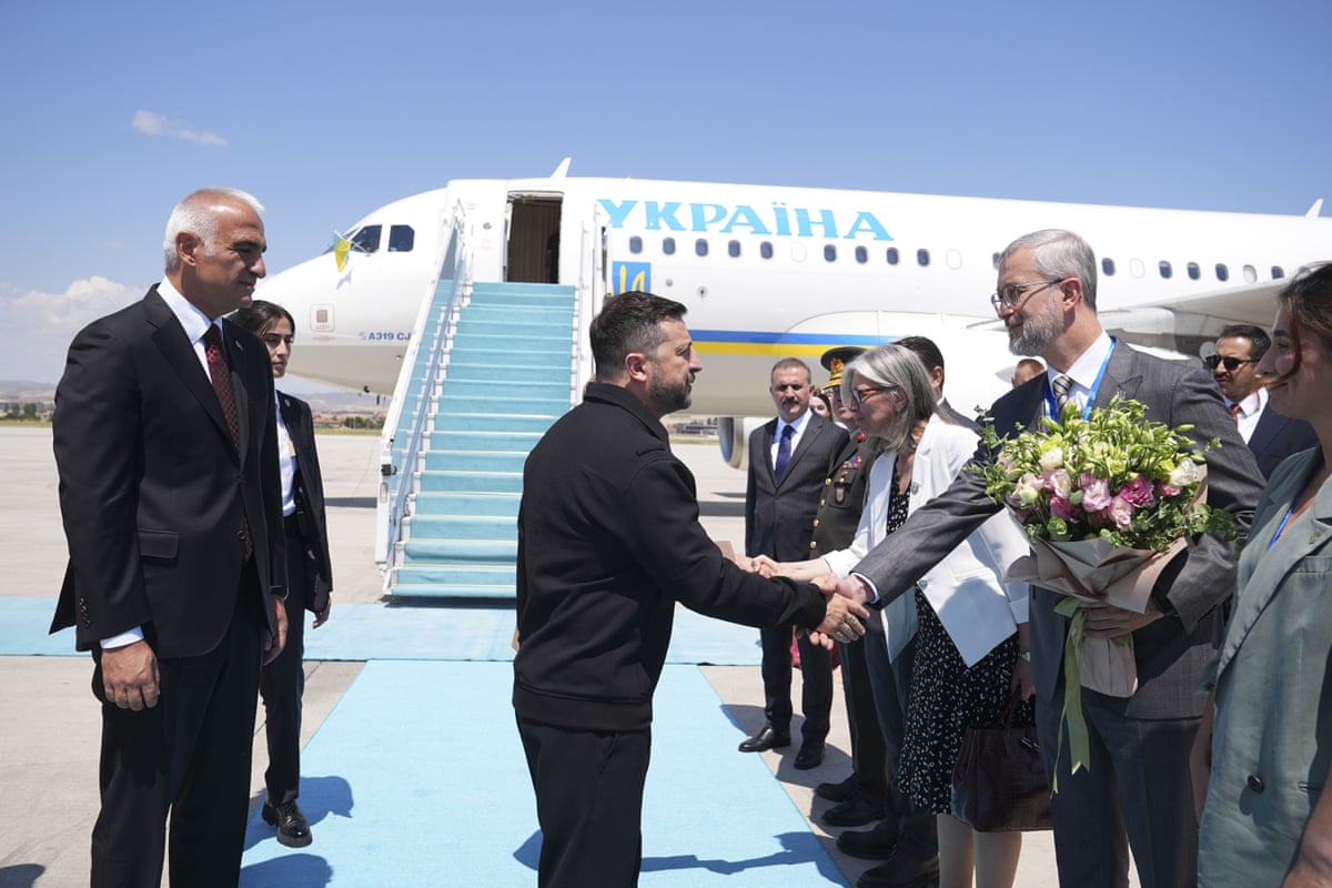 Ukrainian president Volodymyr Zelenskyy is welcomed by the Turkish culture minister Mehmet Nuri Ersoy at Esenboga Airport in Ankara, Turkey.