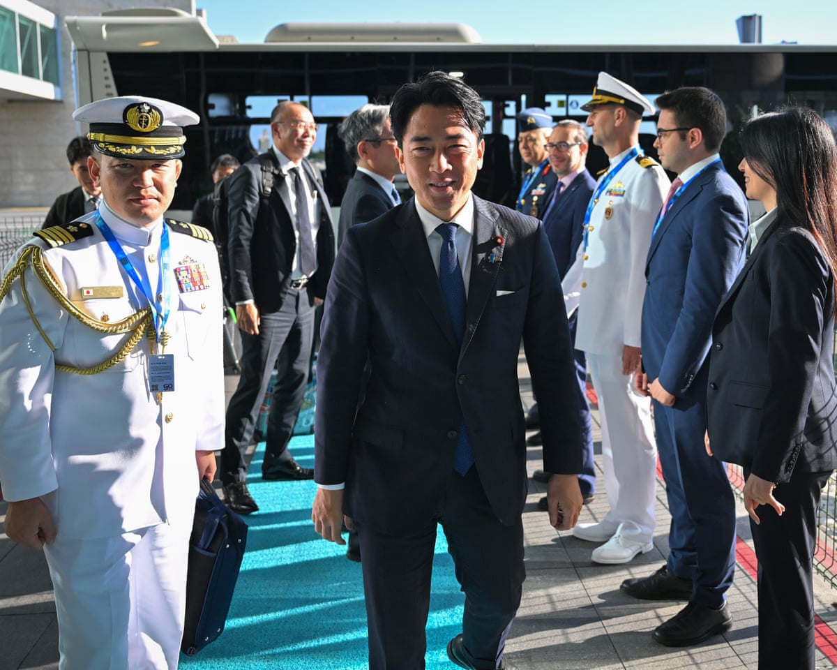 Japanese defence minister Shinjiro Koizumi is welcomed by officials upon his arrival at Esenboga Airport.