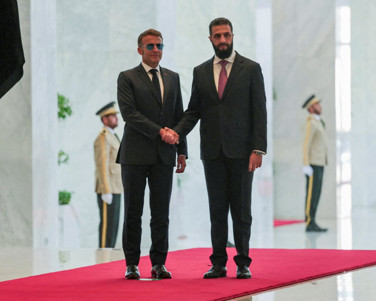 France's president Emmanuel Macron meets Syrian president Ahmed Al-Sharaa at the People's Palace in Damascus, Syria.