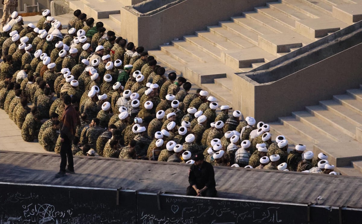 Mourners perform the funeral prayer (Salat al-Janazah) for Khamenei in Tehran.
