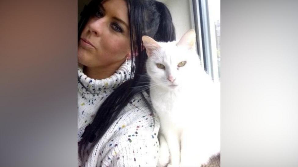 Selfie with Mandy (left) and white Short hair cat 'Snowy' (right). Mandy has her head tilted towards Snowy, while he looks straight into the camera.