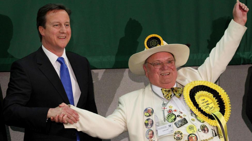 Then-prime minister David Cameron shaking hands with Alan