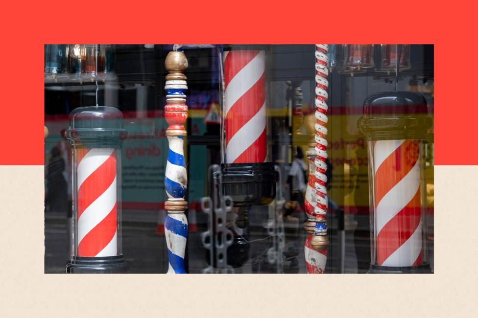 A selection of red-and-white and blue-and-white striped barber shop poles