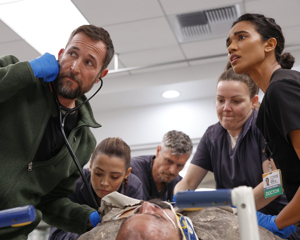 Noah Wyle, left, in a scene from The Pitt.