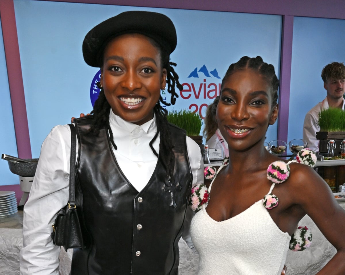 Little Simz and Michaela Coel enjoy the Evian VIP suite.