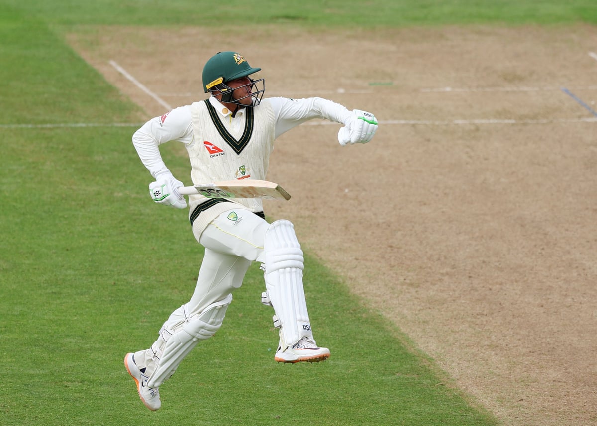 Usman Khawaja leaps into the air