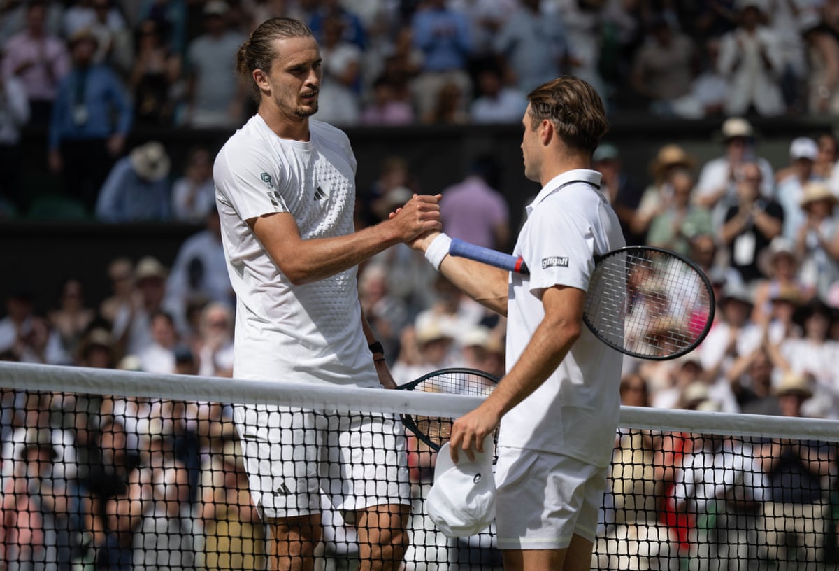 Alexander Zverev shakes hands with Arthur Fery after the match.