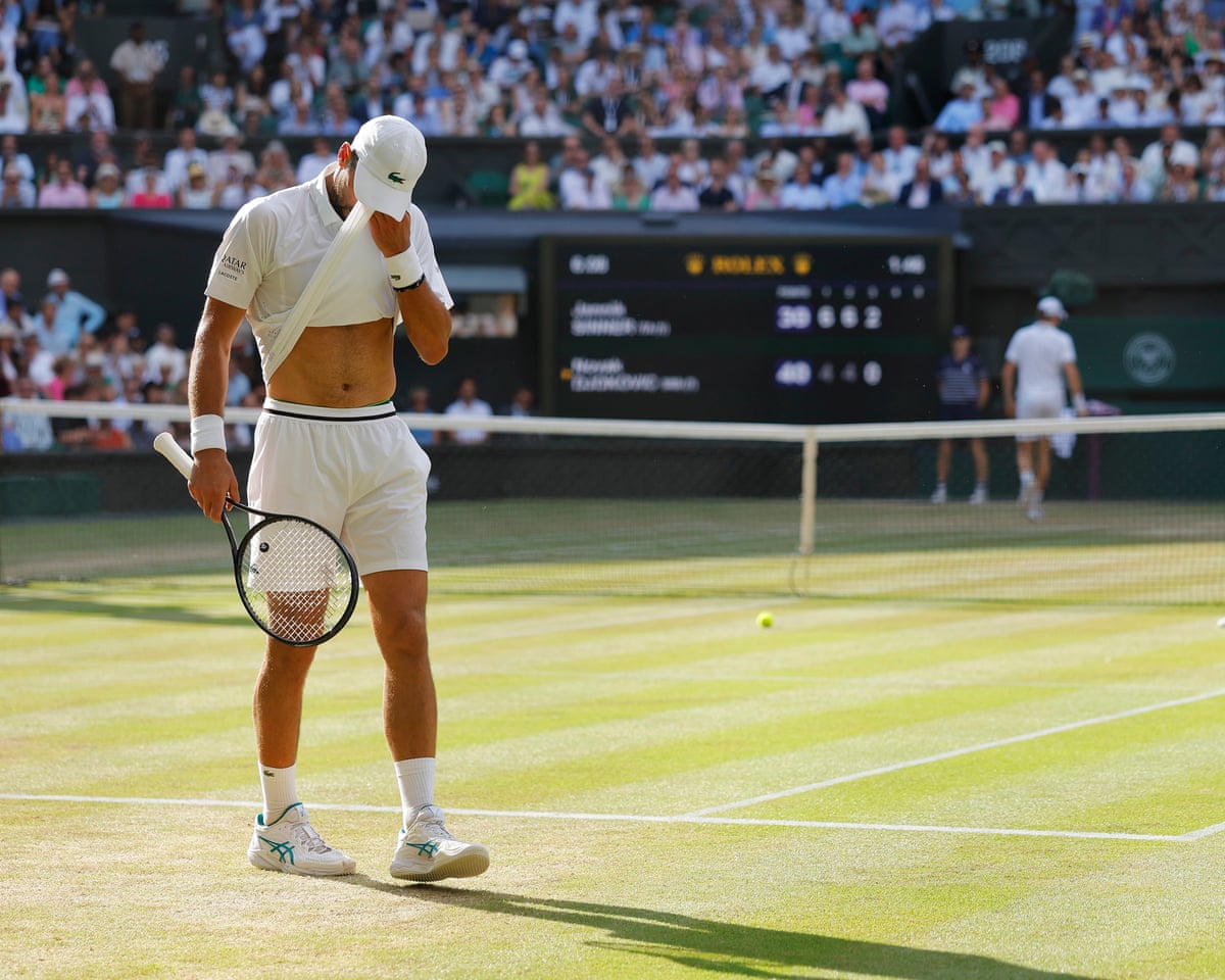 Novak Djokovic feels the heat during a his semi-final against Jannik Sinner