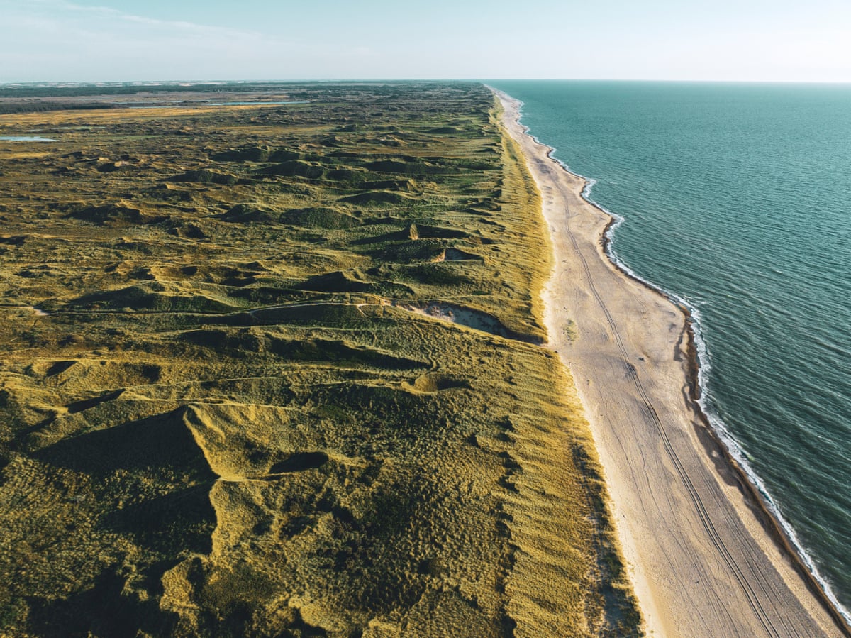 Aerial view of sand dunes at Thy alongside the sea