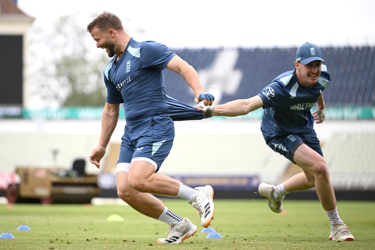 Harry Brook tugs Ben Duckett's shirt during training