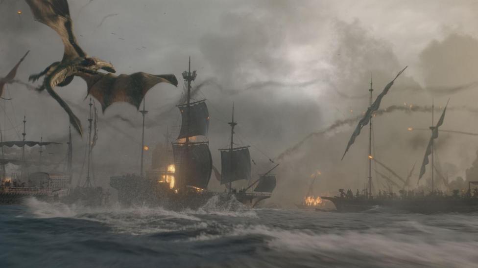 Scene from House of the Dragon 3 with dragon flying over the sea and sailboats with tall masts on fire in stormy water