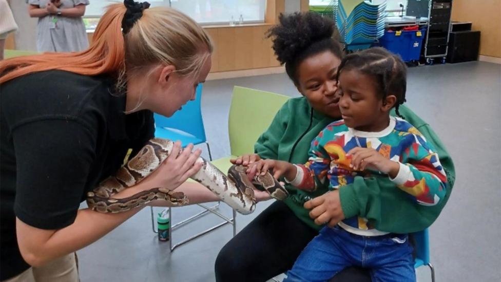 Natalie and her eight-year-old son Azuriah at charity Sense in Selly Oak.