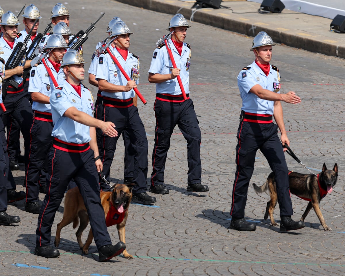 Members of the firefighter brigade of Paris parade during the annual Bastille Day military parade on the Champs-Elysees Avenue in Paris.