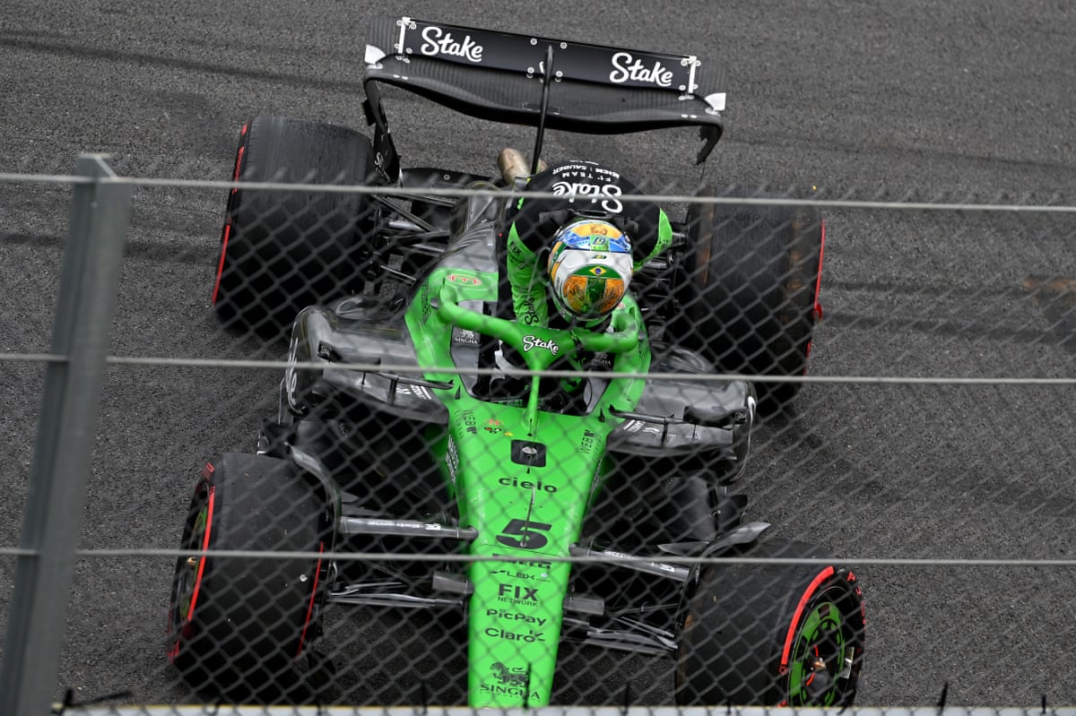 Sauber Formula One car next to fence