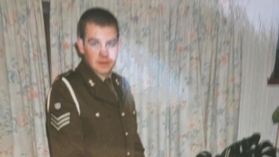 An old photo of Griffiths in an Army blazer.