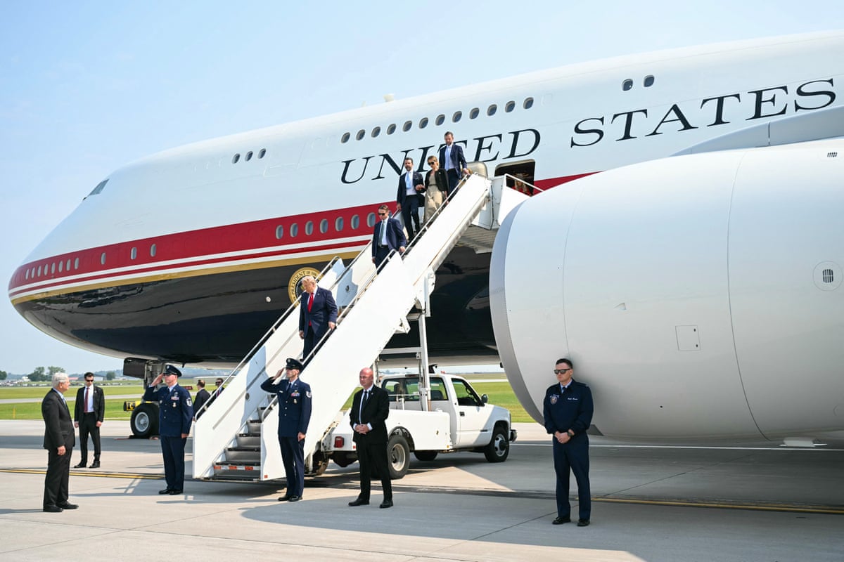 Donald Trump disembarks from the Qatar-gifted Air Force One after his first flight on the aircraft, in Bismarck, North Dakota, on 1 July 2026.