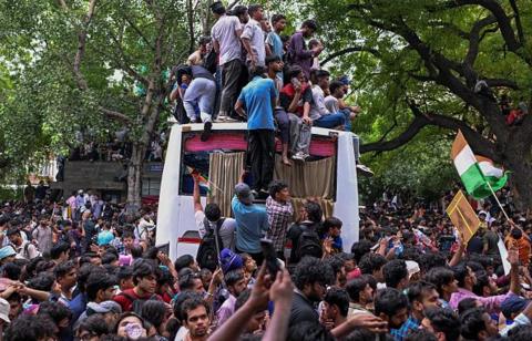 Protesters gather as they take part in a demonstration organised by the Cockroach Janta Party (CJP) at Jantar Mantar during the opening day of Parliament's Monsoon Session on July 20, 2026 in New Delhi,