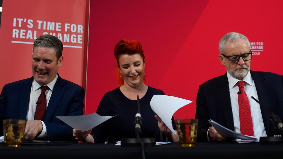 Louise Haigh pictured alongside Keir Starmer and Jeremy Corbyn behind a banner saying