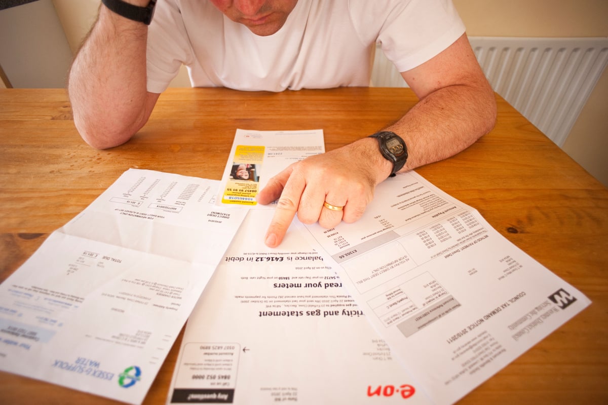 Man worrying over his household bills