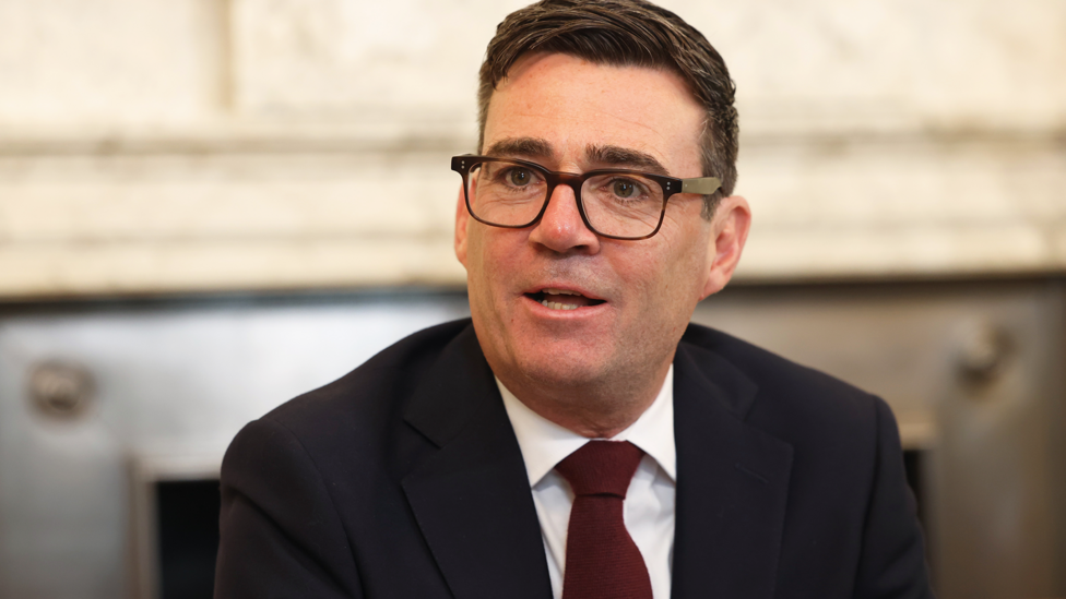 Andy Burnham in a black suit at his first cabinet meeting as prime minister