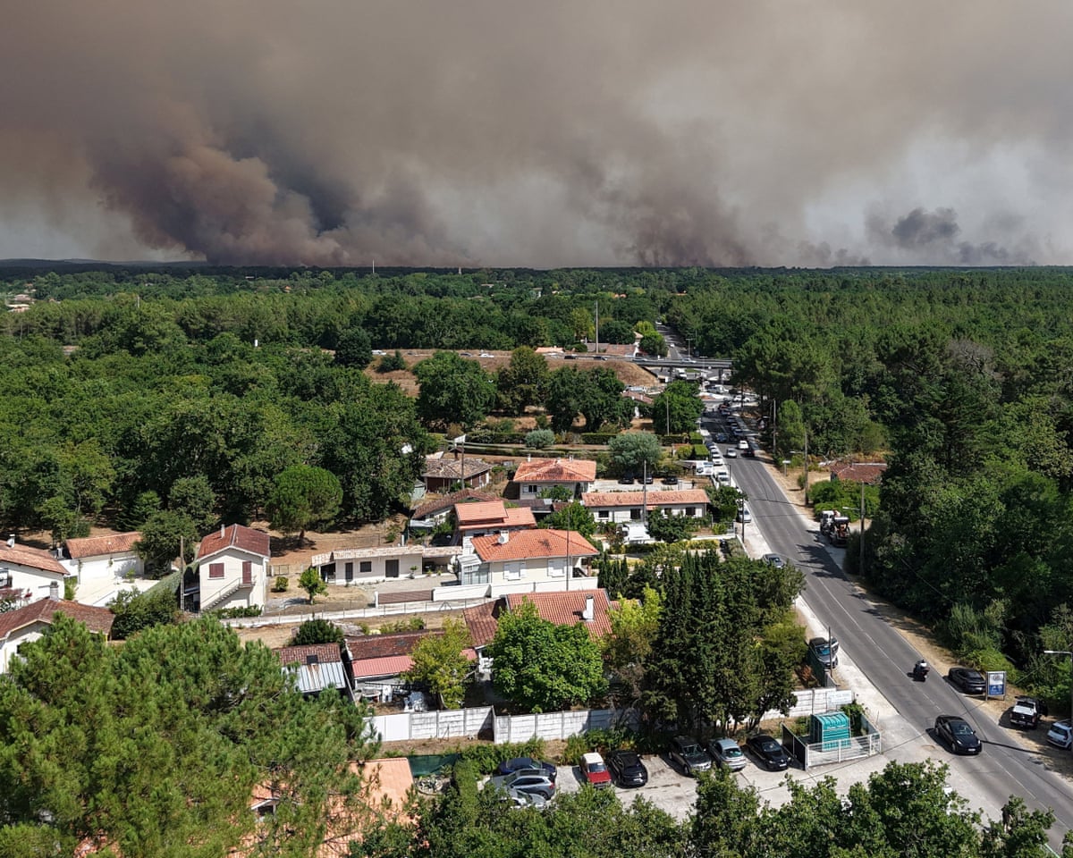 A drone view shows a wildfire burning in a forest area near Lege Cap-Ferret and the Bassin d'Arcachon in the Gironde department in France.