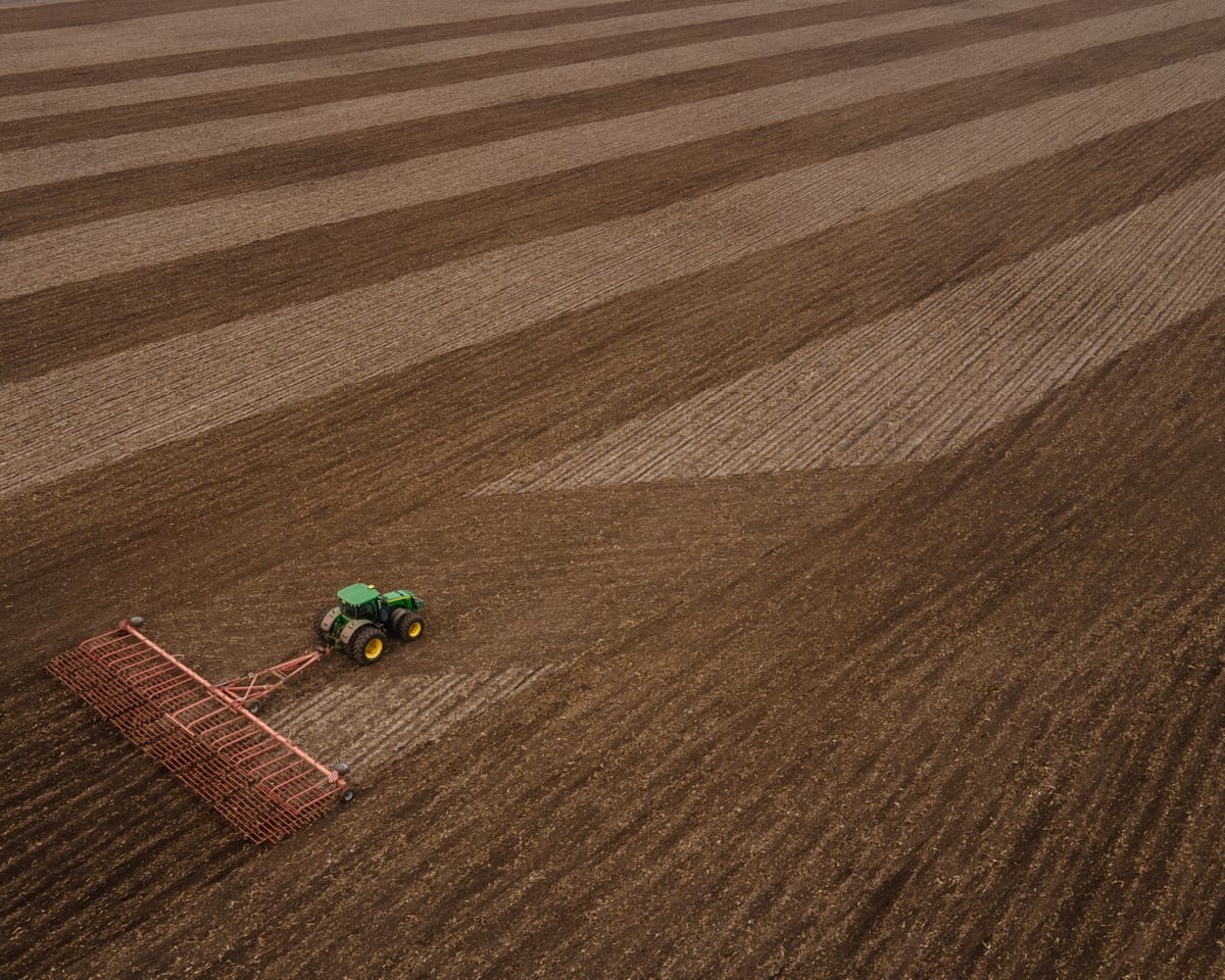 A ploughing machinery prepares the soil ahead of the grain sowing campaign in Ukraine in March 2024.