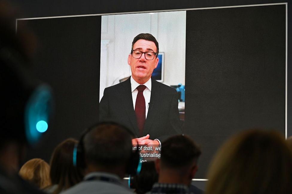 A pre-recorded message by UK Prime Minister Andy Burnham is played prior a speech by Defence Secretary Wes Streeting during the Farnborough International Air Show 2026