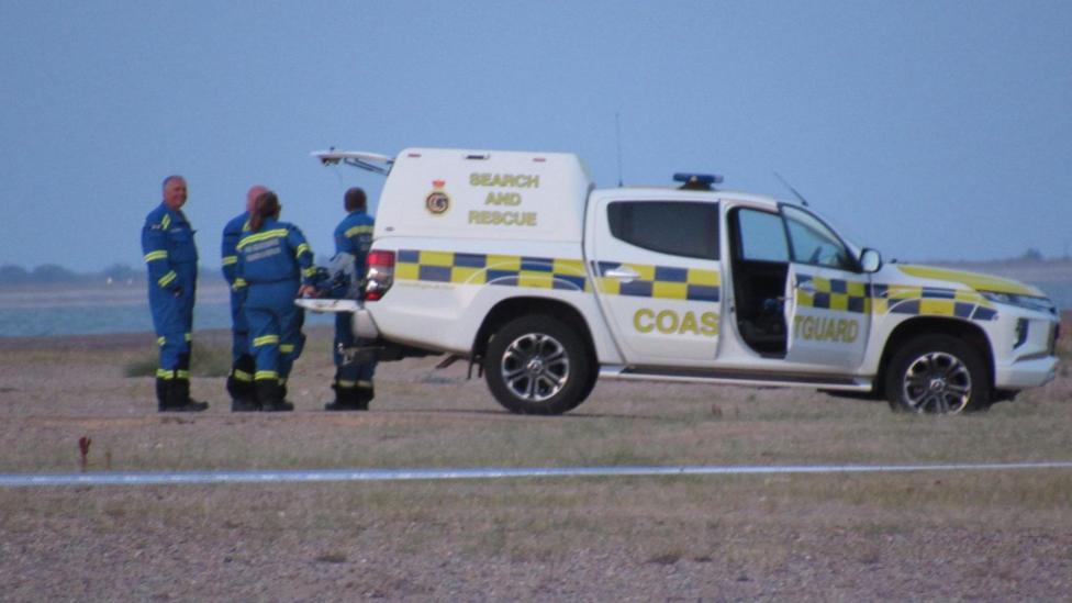 A white Coastguard vehicle with the words