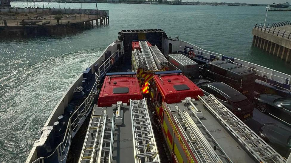 Fire engines on a ferry heading to the isle of wight