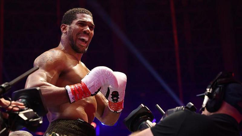 Anthony Joshua tells everyone to calm down after he knocks Kristian Prenga out in the second round