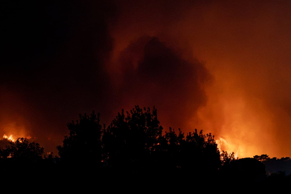 Evacuation efforts continue in the towns affected by the wildfires as firefighters battle the blaze in La Adrada, in the Ávila province.