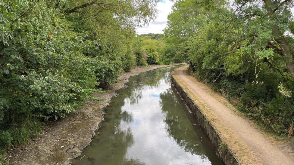 A canal with some of the bed on show 