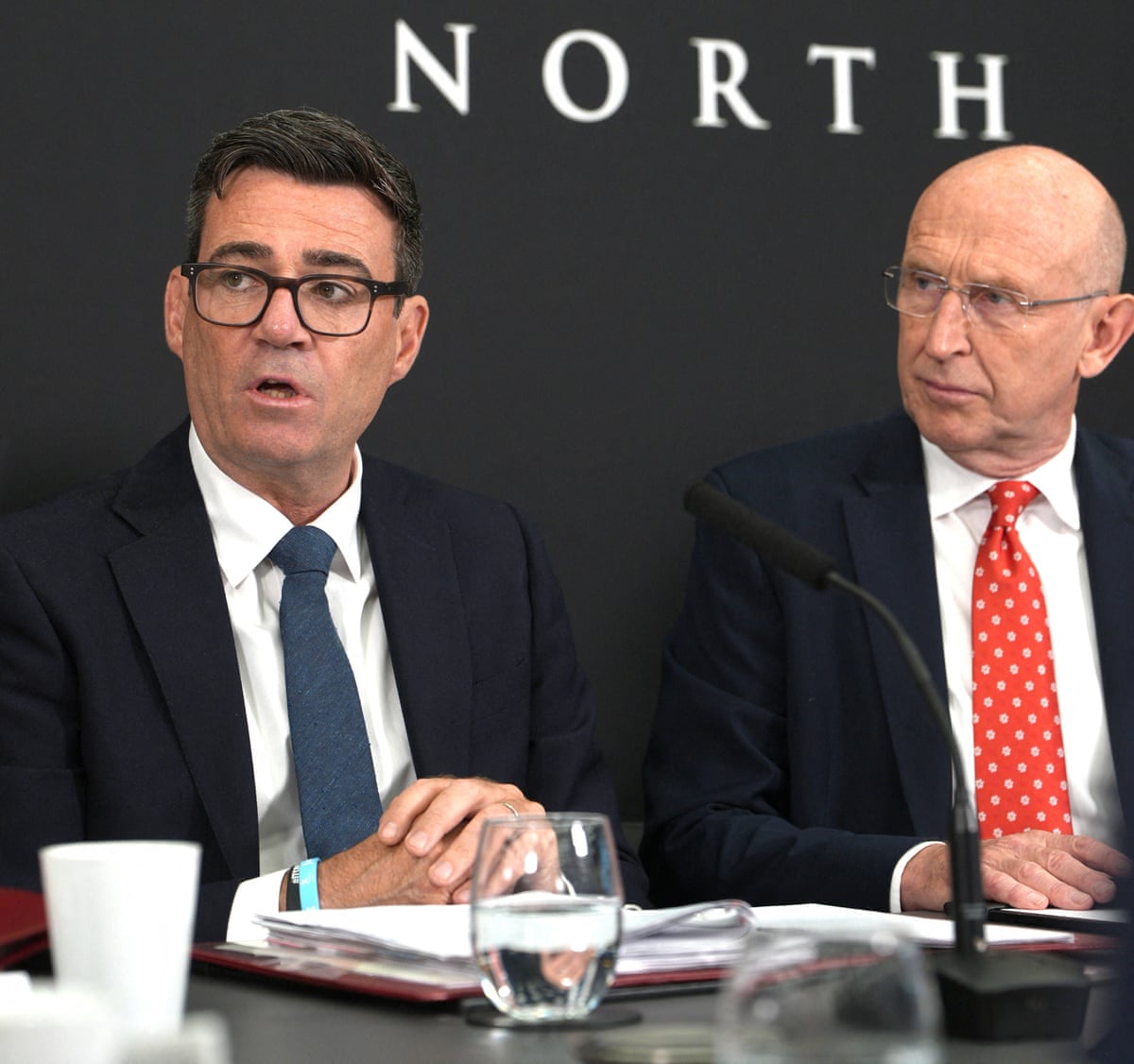 Prime minister Andy Burnham sits next to John Healey (right)