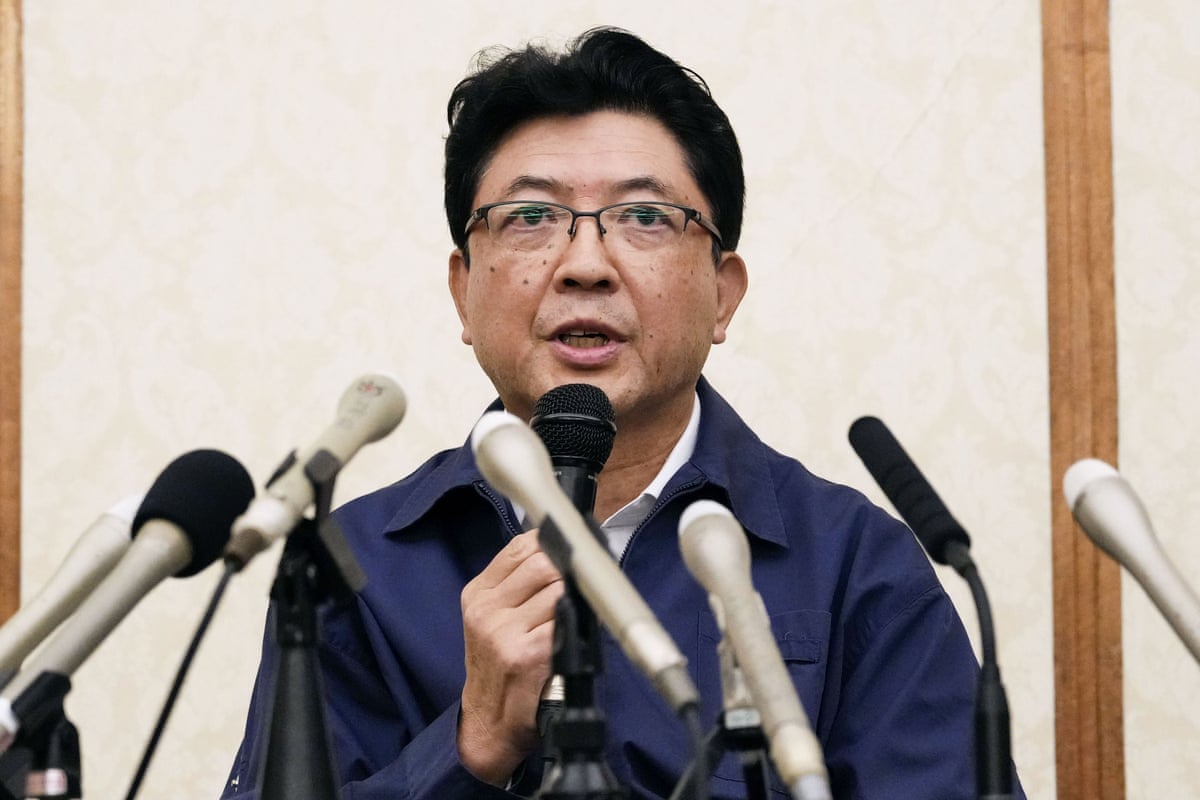Akio Yoshida, president and representative executive officer of Aeon, speaking at a news conference.