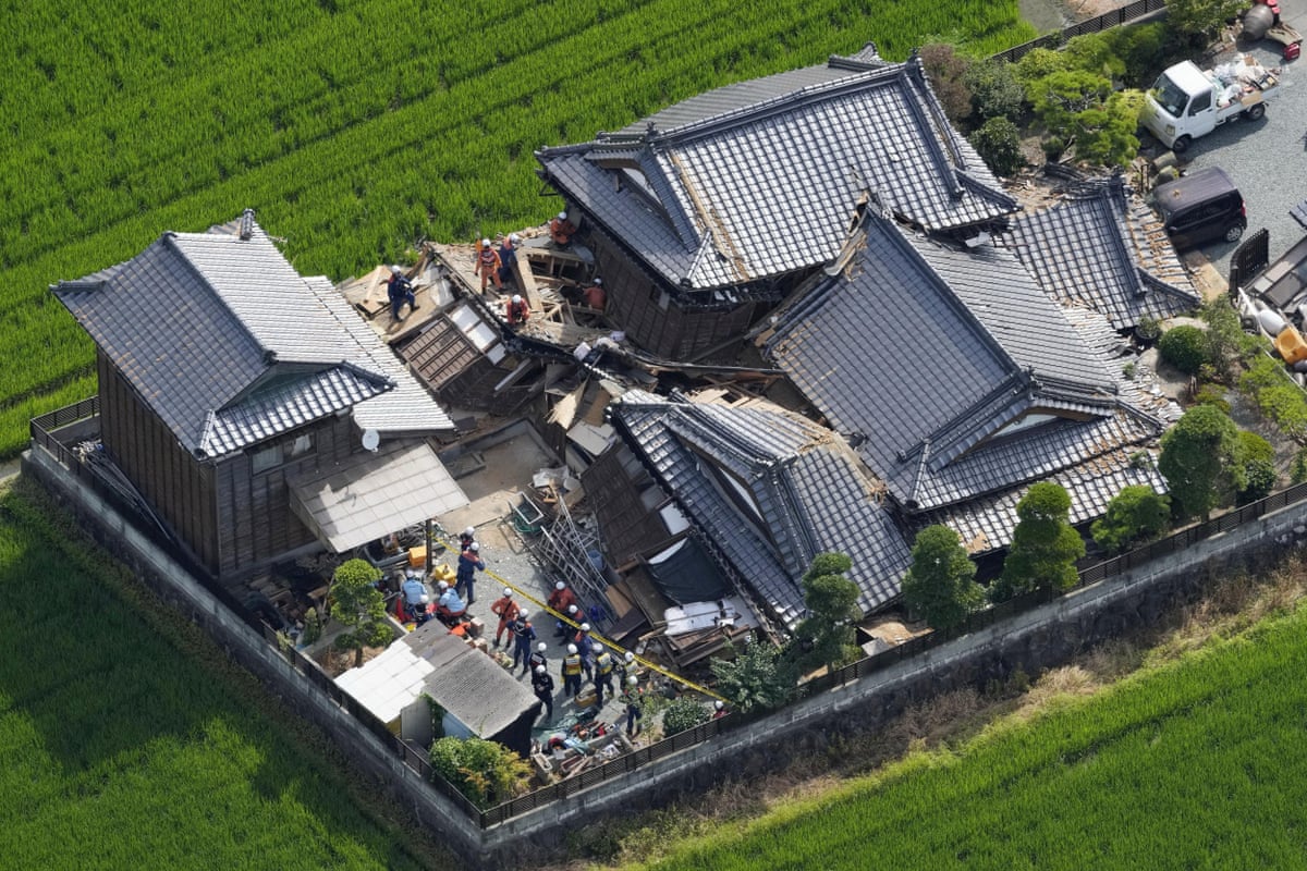 An aerial view of a collapsed home. 
